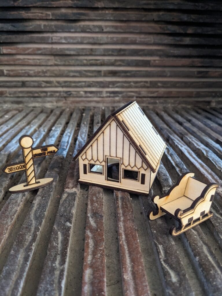 Village de Noël maison bardage et accessoires panneau traineau